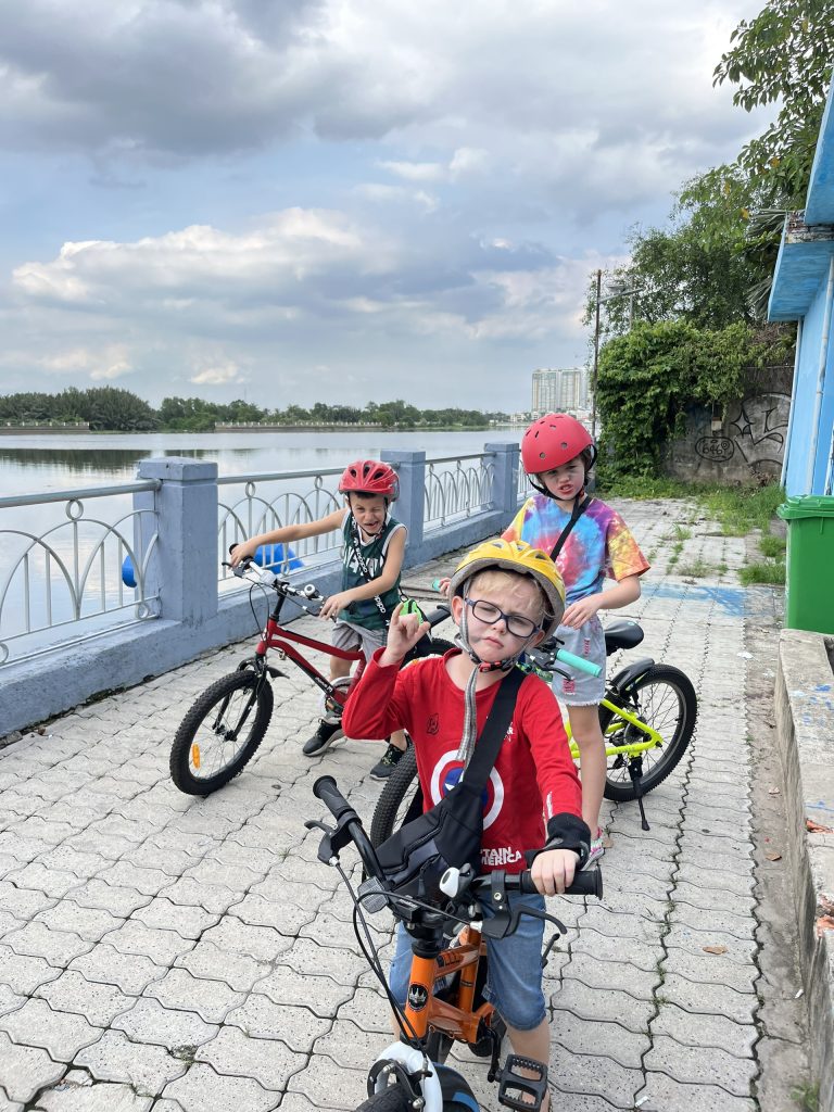 Fun outdoor biking adventure by the lake - English-speaking babysitter Anh Nguyen in Vietnam
