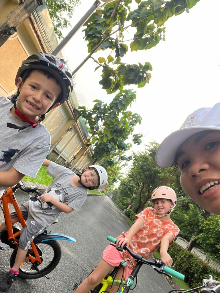 Joyful selfie during afternoon cycling trip - English-speaking babysitter Anh Nguyen in Vietnam