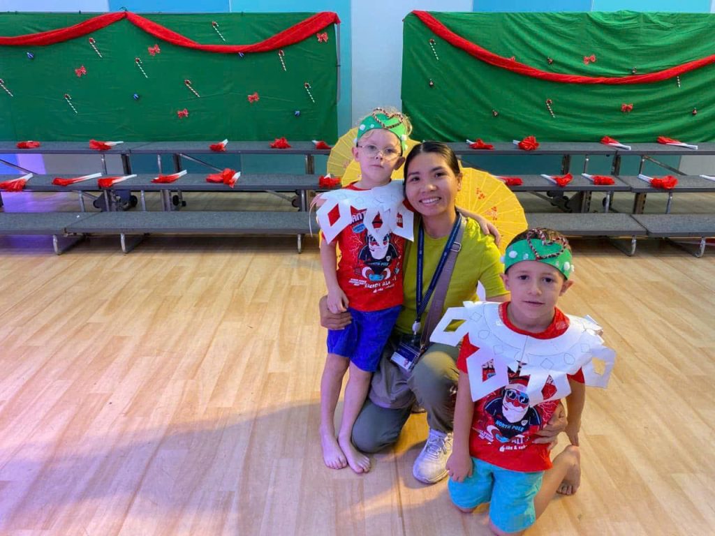 Supporting milestones at a festive holiday school play - English-speaking babysitter Anh Nguyen in Vietnam