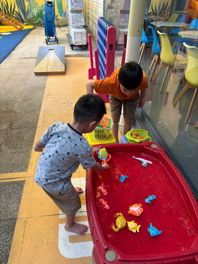 Children playing in an indoor ball pit at a playground in Ho Chi Minh City