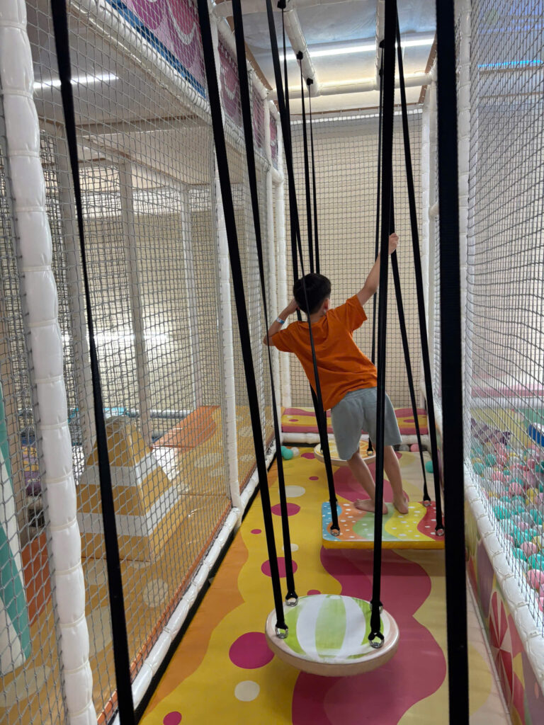 Children playing in an indoor ball pit at a playground in Ho Chi Minh City